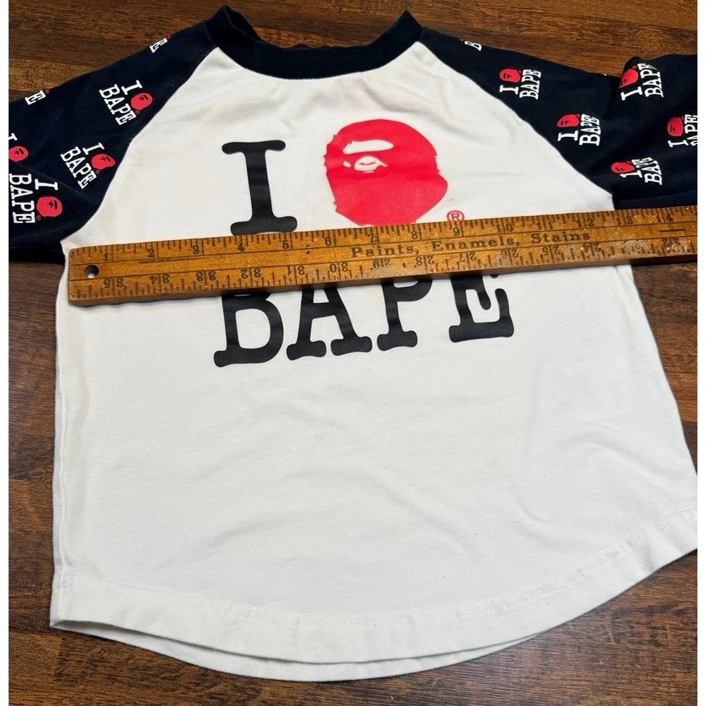 Bathing Ape BAPE kids raglan l/s shirt size 110. 2/3T. Patterned logo sleeves
